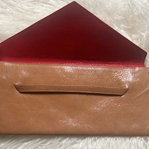 TUSK tan clutch bag